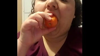 sucking a tomato like a dick